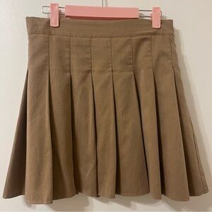 Beige pleated mini skirt